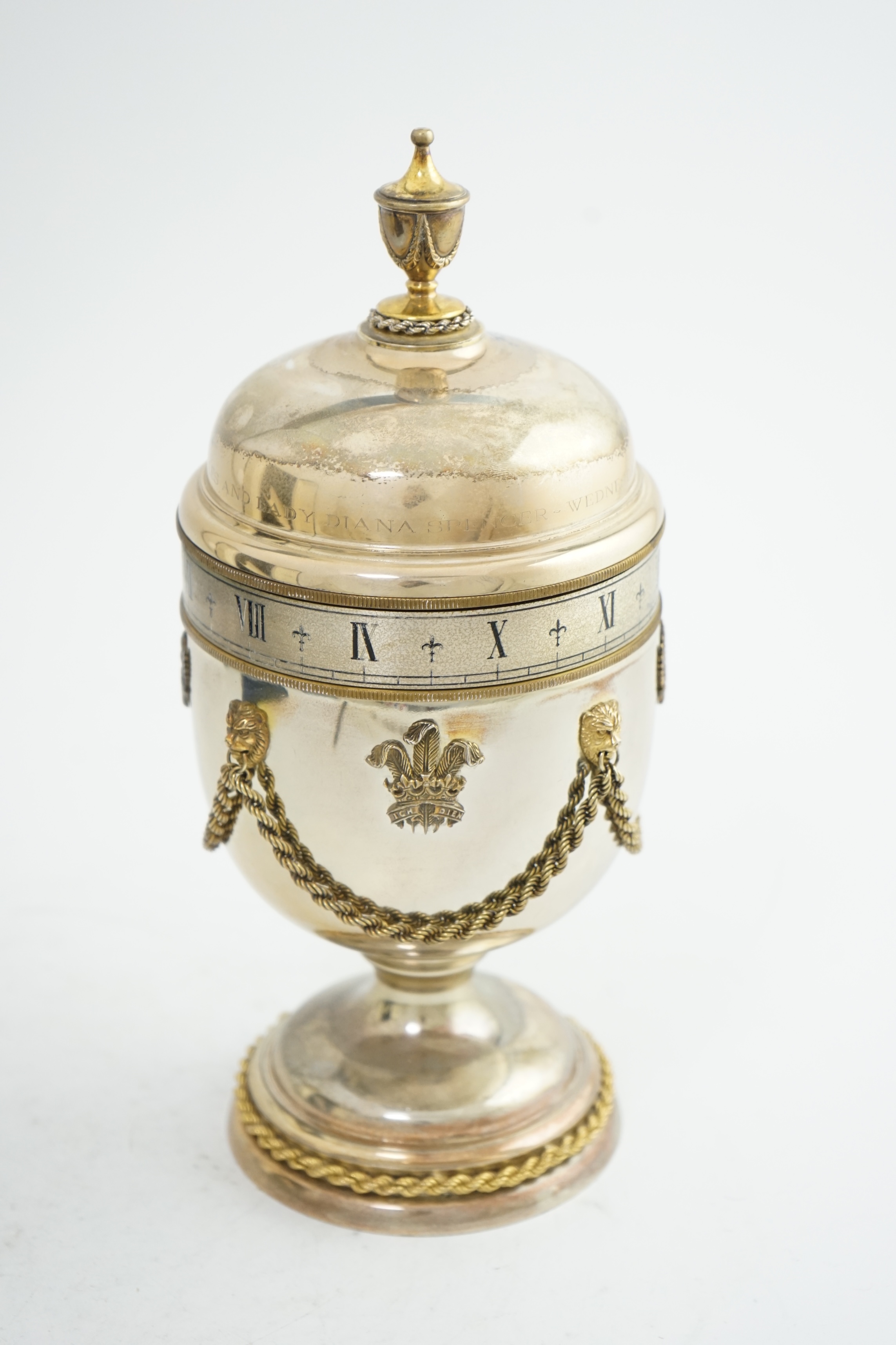 A cased Limited Edition Commemorative Prince of Wales and Lady Diana Spencer 1981 Royal Wedding 'Prince of Wales' silver eight day manual wind clock, by Mappin & Webb